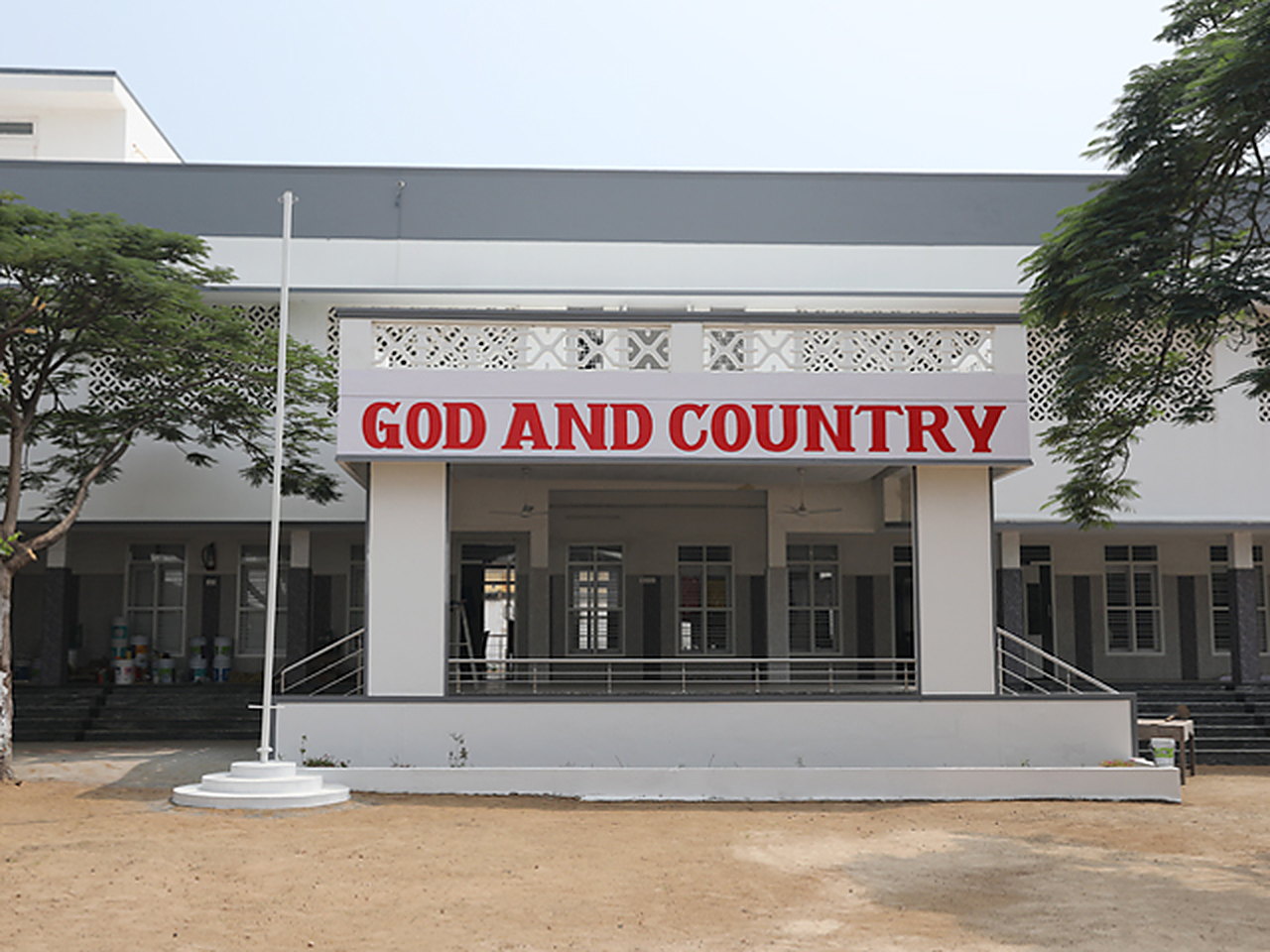 The school portico beneath the motto "God and Country"