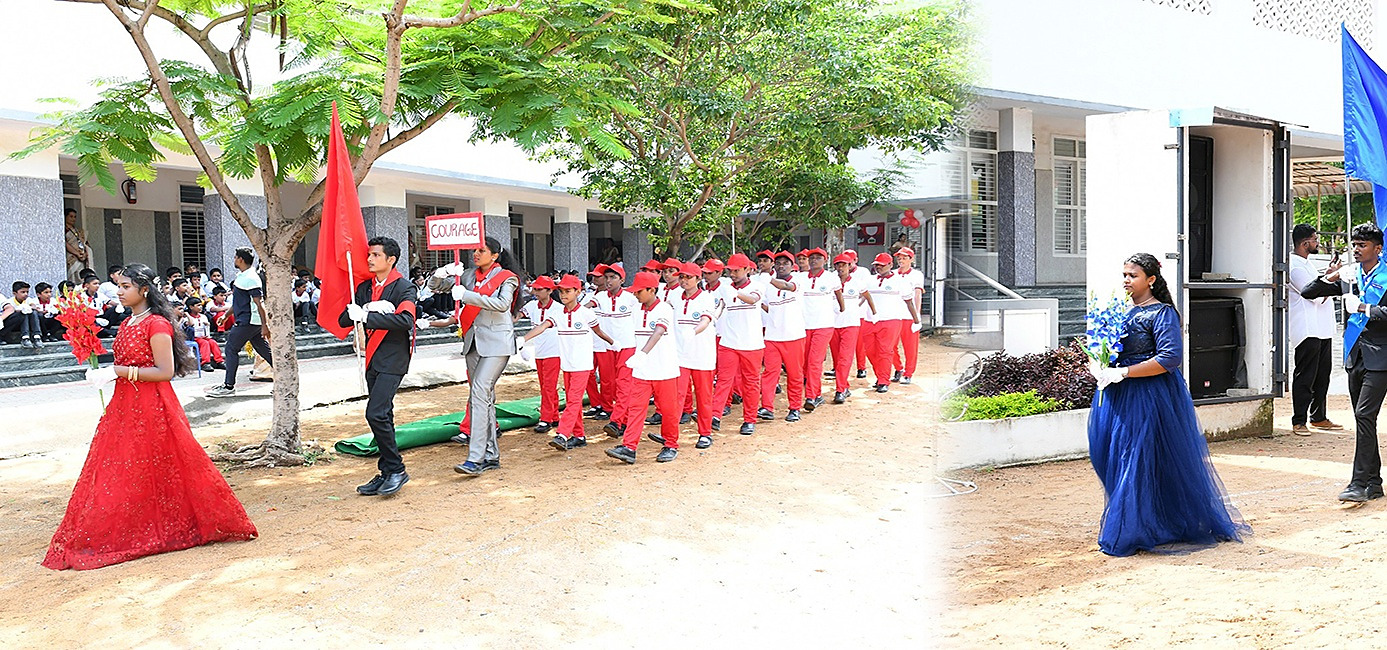 Students marching past behind a "Courage" placard on sports day