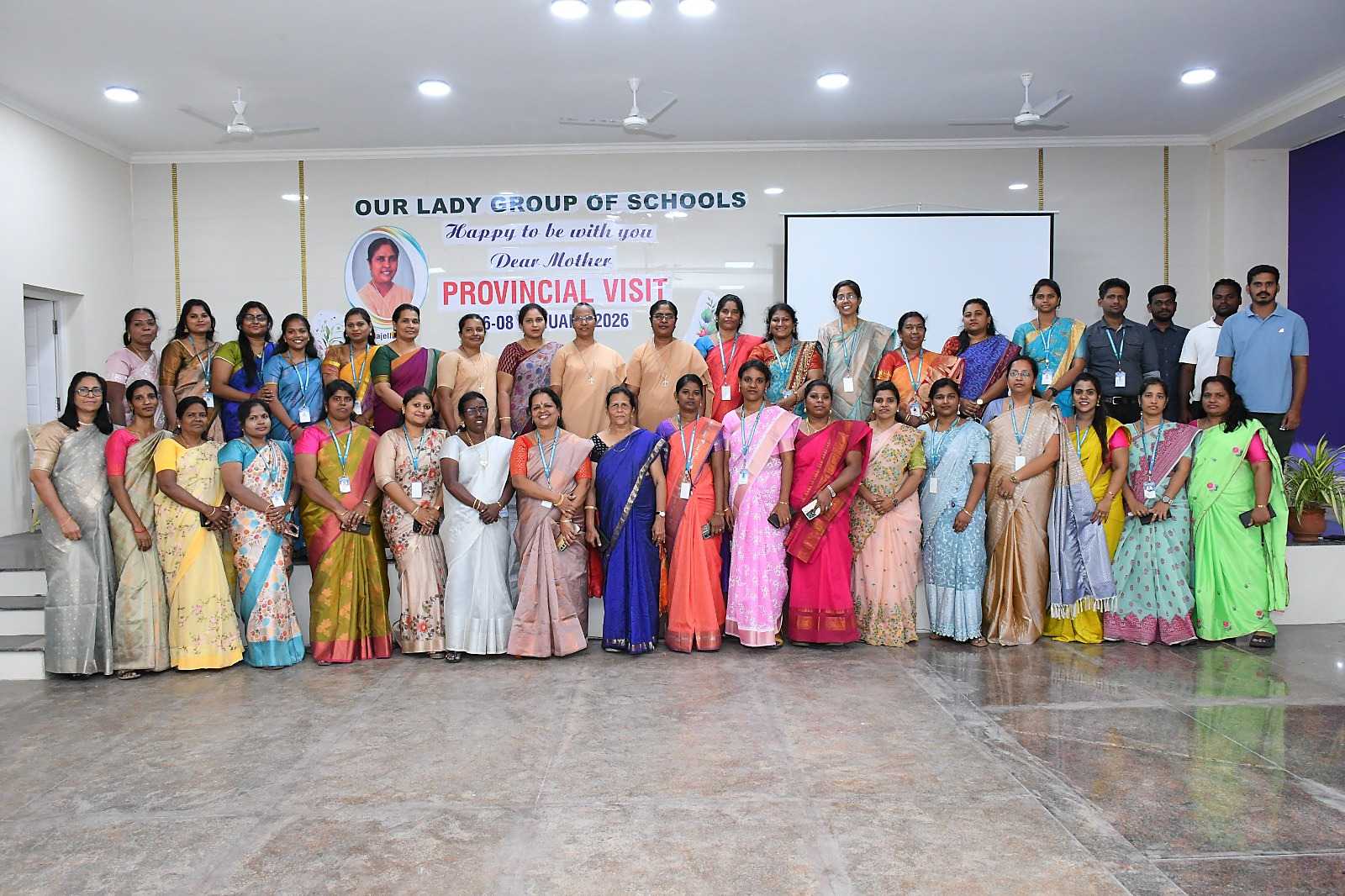 The staff of Our Lady School of Excellence assembled in the school hall