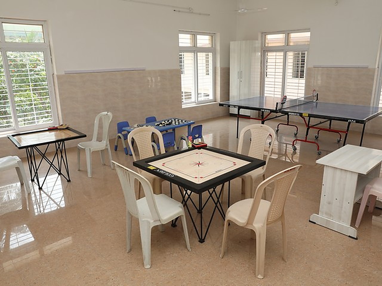 The indoor games room, with carrom, chess and table tennis