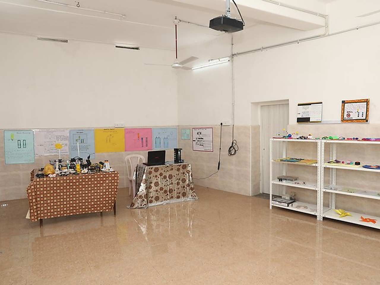 The exhibition room, with project displays along the walls