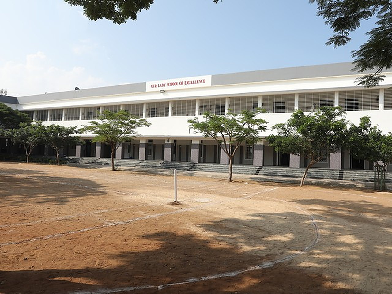 The school building seen from across the playground
