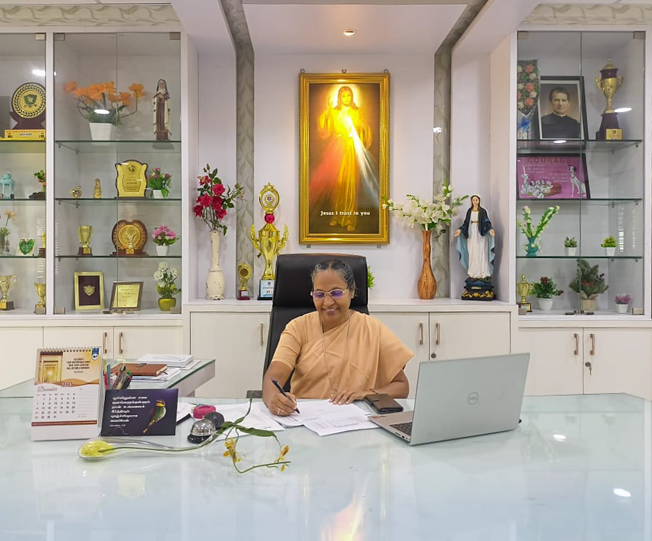 Sr. Dr. Peter Selvarani, Principal, at her desk in the school office